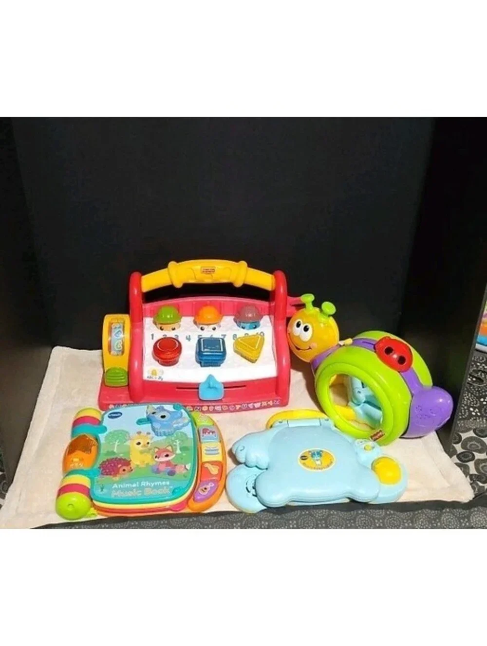 Large lot of 4 interactive baby and toddler learning toys VTech and Fisher-Price